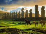 Horses roam in front of Ahu Tongariki on Easter Island’s east coast.